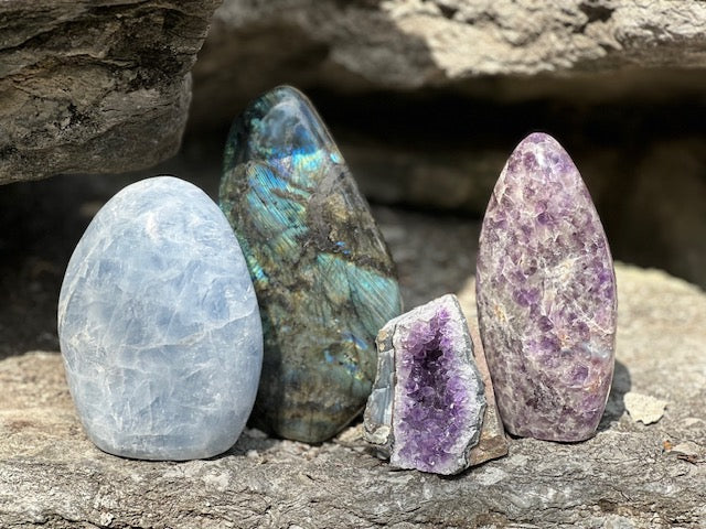 A set of 4 large crystals side by side